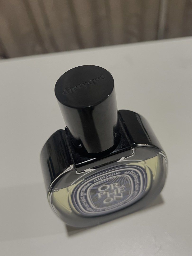 Diptyque Orphéon Eau de Parfum (Category: Fragrance & Deodorants) located in Quezon City. Submitted by kirez (Listing ID 1470239895, Image 2). Description: - Authentic Diptyque Orphéon Eau de Parfum - Classic oval glass bottle with black embossed cap and signature blue/white label - Fragrance level is near the top shoulder (almost full) - Well-maintained spray nozzle - Perfect for daily wear or as a signature scent.