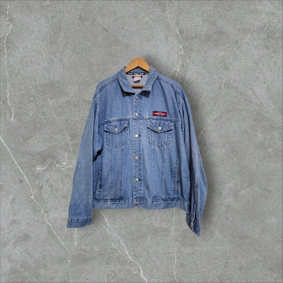 Disneyland denim trucker jacket (Category: Coats, Jackets and Outerwear) located in Baguio. Submitted by fadexquisite (Listing ID 1470273439, Image 1). Description: Disneyland denim trucker jacket Large 28x26 Excellent condition 900 plus ship fee.