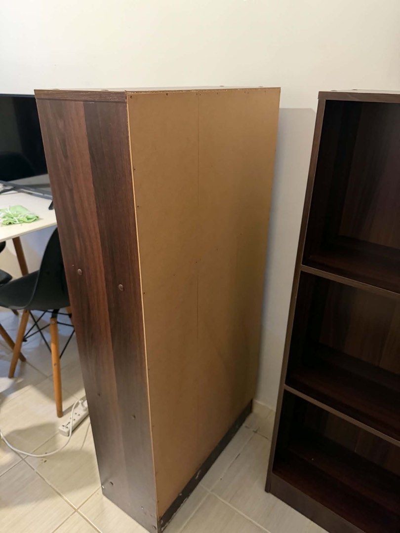 Display Cabinet (Category: Shelves, Cabinets & Racks) located in Mandaluyong City. Submitted by artyreal (Listing ID 1470245967, Image 3). Description: - Set of 2 dark wood finish bookcases -price is each - 3 spacious open shelves per unit for books, decor, or binders - Sturdy construction with finished sides and exposed hardware - Clean overall appearance with minor wear at the bottom base edges - Ready for pickup.
