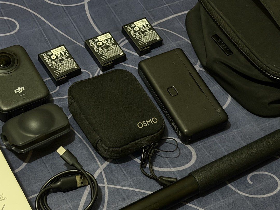 DJI Osmo 360 Adventure Combo + BASH mini bag (Category: Video Cameras) located in Makati City. Submitted by mickeyme_b (Listing ID 1470264257, Image 3). Description: - Item: DJI Osmo 360 Adventure Combo bundle - Color: Black - Condition: Like new / Complete set - Includes: - Main camera unit with protective lens cover - 3 x Extreme Batteries Plus with battery case - 1.2-meter invisible selfie stick - USB-C charging cable - Osmo pouch - Large blac