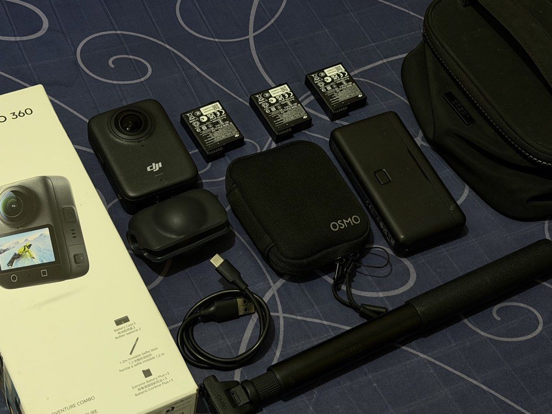DJI Osmo 360 Adventure Combo + BASH mini bag (Category: Video Cameras) located in Makati City. Submitted by mickeyme_b (Listing ID 1470264257, Image 2). Description: - Item: DJI Osmo 360 Adventure Combo bundle - Color: Black - Condition: Like new / Complete set - Includes: - Main camera unit with protective lens cover - 3 x Extreme Batteries Plus with battery case - 1.2-meter invisible selfie stick - USB-C charging cable - Osmo pouch - Large blac