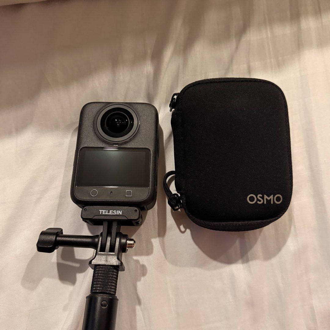 DJI Osmo 360 Camera (Category: Cameras) located in Manila. Submitted by bc040302 (Listing ID 1470280933, Image 2). Description: Slightly nego if sure buyer! - DJI Osmo 360 Camera bundle ready for immediate use - Includes ₱2,000 worth of freebies: Telesin Tripod Stand & Telesin Selfie Stick. - Also comes with Original Charger, Official Sticker, and Original Box. - Comes with original black Osmo protective carrying case & original silicone Osmo cas