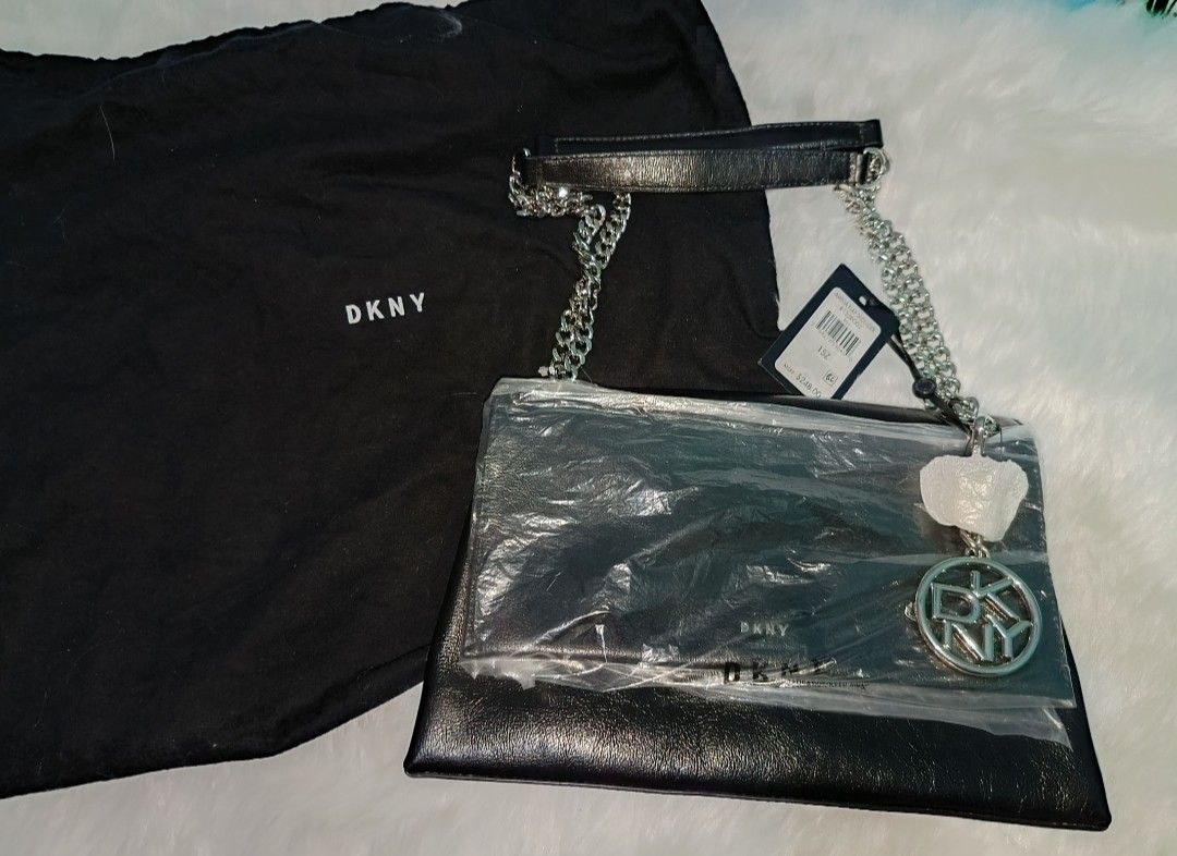 DKNY Amelia Flap Shoulder Bag Black Chain Strap (Category: Luxury Bags & Wallets) located in Rosales. Submitted by lynasonlineshop (Listing ID 1470165497, Image 1). Description: - Brand: DKNY (Amelia Flap Shoulder Bag) - Color: Classic Black Leather - Hardware: Silver-tone chain strap & matching DKNY logo charm - Interior: Zip pocket with signature branded lining - Condition: Brand new with retail tags attached - Inclusions: Original dust bag inc