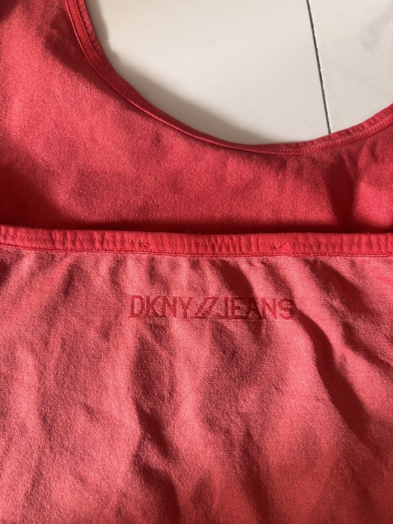 DKNY Halter Top (Category: Sleeveless) located in Manila. Submitted by minieiv._ (Listing ID 1470202265, Image 3). Description: * Pre-loved * Slightly used, 9/10 condition * US bought * Size: US M/L * Nylon Spandex, stretchable * Meetup: Puregold San Mateo, Ampid Mercury * RFS: Decluttering.