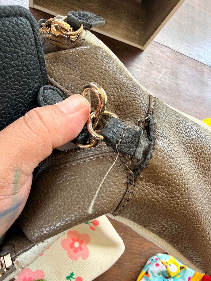 DKNY Multi-tone Satchel Handbag (Category: Luxury Bags & Wallets) located in Manila. Submitted by banopeyeo (Listing ID 1470184533, Image 2). Description: - issue: medjo ripped ung fabric sa side but otherwise in very good condition authentic!! .