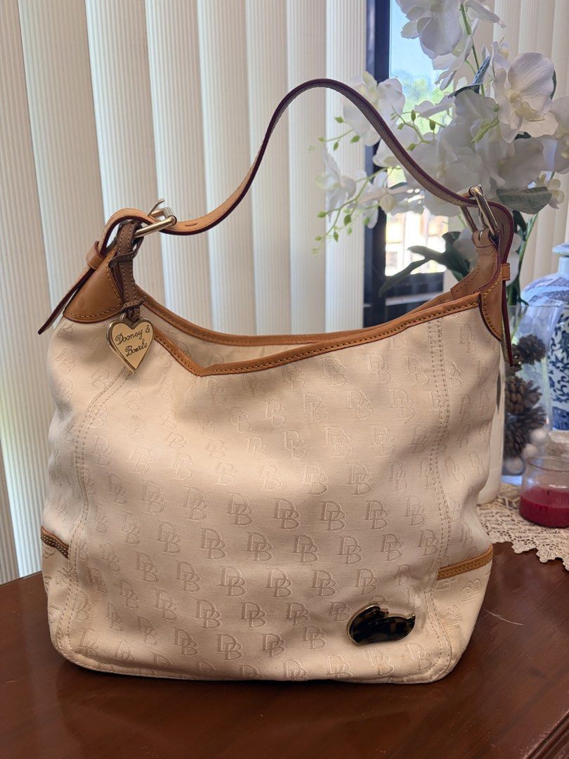 Dooney nd Bourke (Category: Luxury Bags & Wallets) located in San Pascual. Submitted by s3resale (Listing ID 1470142721, Image 1). Description: Leather see photos.