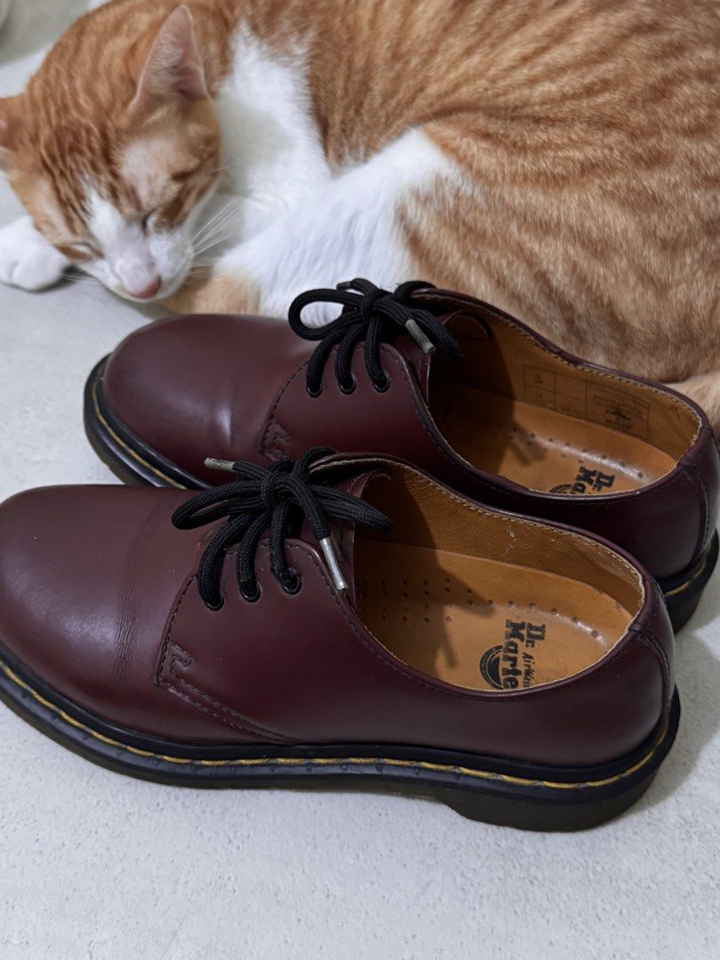 Dr. Martens cherry red (Category: Boots) located in Manila. Submitted by mikmmmmik (Listing ID 1470154049, Image 3). Description: 100% authentic. Price is negotiable. Matigas pa, hindi pa nabreak-in. FREE wonder balsam shoe shine .