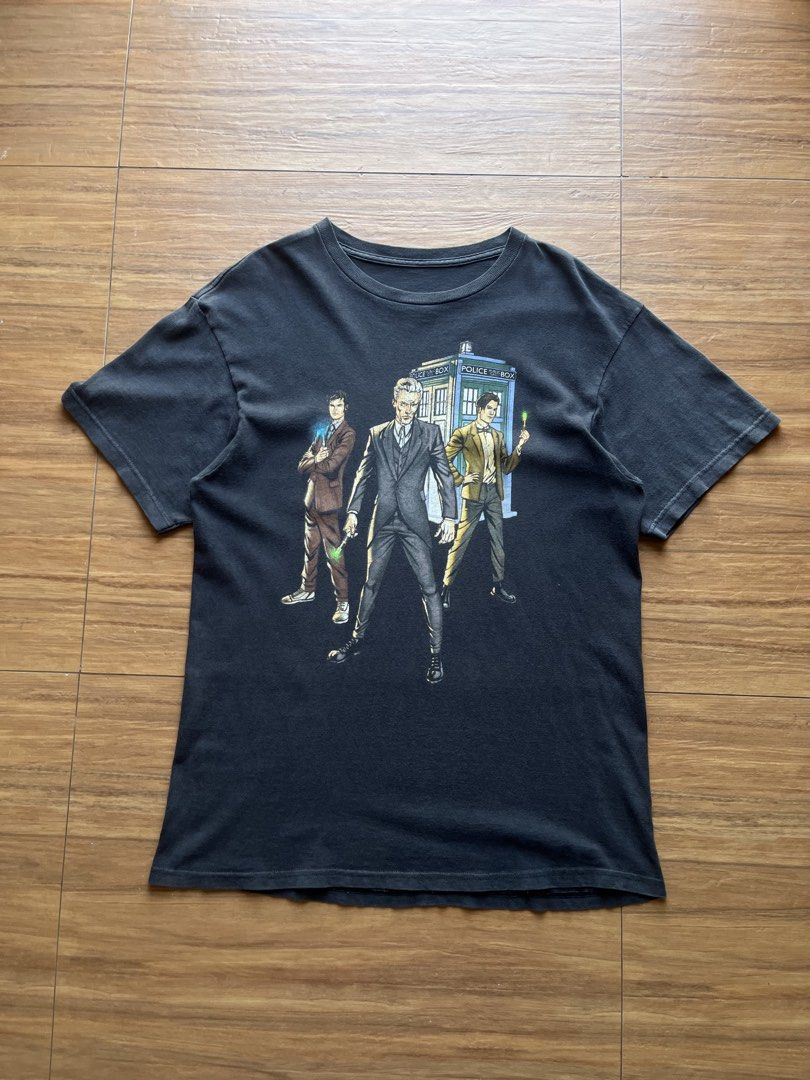 Dr. Who Comics Tee (Category: Tshirts & Polo Shirts ) located in Davao. Submitted by spilled.bins (Listing ID 1470272310, Image 1). Description: Dr. Who Comics Tee Faded Printed Tag Width: 20.5in Length: 29.5in Medium Measurement Cracks | Used Fade Good Condition . Mine: ₱400 +shipping fee on top . Model Reference: Height: 5’5 feet Weight: 68kg.