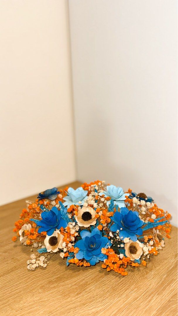 Dried floral arrangements (Category: Flowers & Bouquets) located in Quezon City. Submitted by 2cnds.ph (Listing ID 1470192916, Image 3). Description: - Zero maintenance required, no watering needed - Versatile centerpiece decor for tables, shelves, and desks - Available in for cemetery and columbarium 🌸CAN REQUEST COLOR AND DESIGN Price may vary for different sizes.