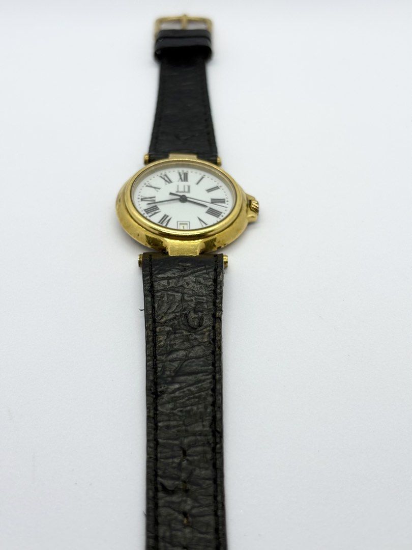 Dunhill Millenium dress watch (Category: Luxury Watches) located in Iloilo. Submitted by sanfinowatches (Listing ID 1470281254, Image 2). Description: 1990s Dunhill Aftermarket strap. Original signed buckle Condition: Fair (visible wear traces and/or scratches) Watch only. No inclusions.