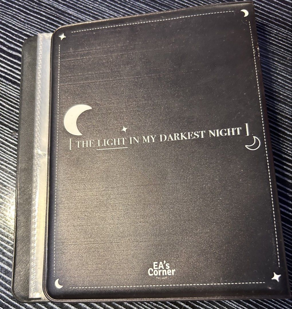 EA's Corner My Moonlight Photocard Binder Dark Black (Category: K-Wave Merchandise) located in Pasig City. Submitted by ssalgnowk (Listing ID 1470190023, Image 2). Description: - Includes inner sleeve pockets and a front display window. - Good for organizing Kpop photocards or collectible cards..