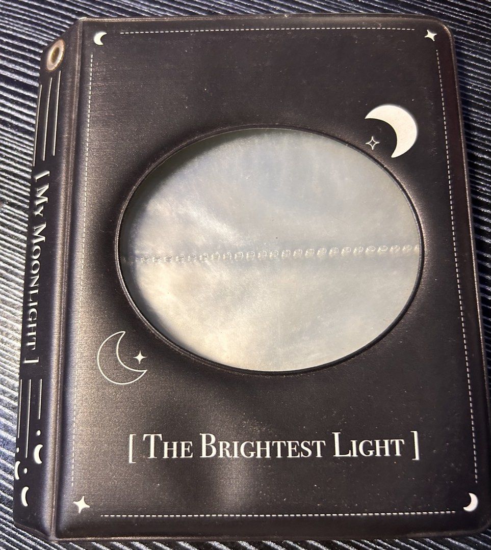 EA's Corner My Moonlight Photocard Binder Dark Black (Category: K-Wave Merchandise) located in Pasig City. Submitted by ssalgnowk (Listing ID 1470190023, Image 1). Description: - Includes inner sleeve pockets and a front display window. - Good for organizing Kpop photocards or collectible cards..