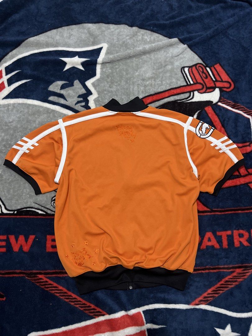 Ecko Unltd. Short Sleeve Track Jacket Orange (Category: Coats, Jackets and Outerwear) located in Tanza. Submitted by 1954_street (Listing ID 1470305986, Image 3). Description: ECKO large 27x31 excellent condition 1500 - Brand: Ecko Unltd. (Official Tagged Product) - Size: Large - Color: Vibrant orange with black/white contrast piping - Design: Large embroidered cowboy bull logo on chest, graphics on upper and lower back - Features: Full zip closu