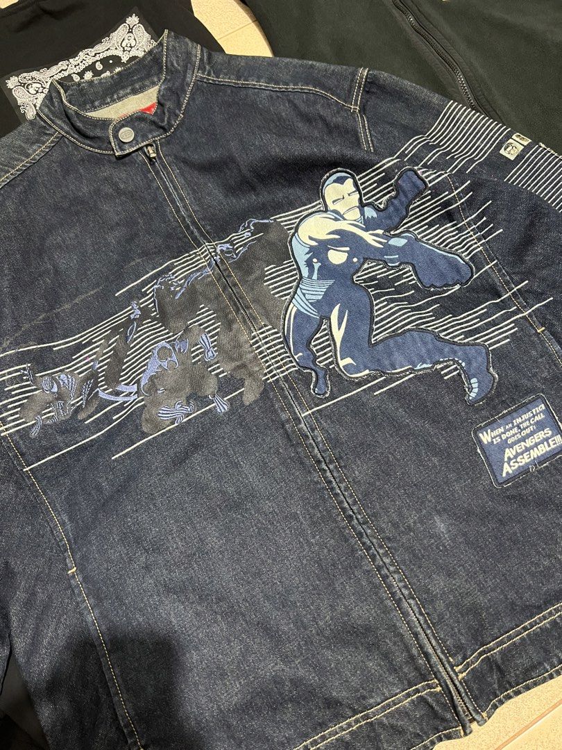 Ecko Untd. Marvel Avengers Denim Jacket (Category: Coats, Jackets and Outerwear) located in Cebu City. Submitted by ianjoseph24 (Listing ID 1470182904, Image 2). Description: - Brand/Collab: Ecko Untd. Denim Foundry x Marvel Avengers - Size: XL - Color: Dark blue - Material: Heavyweight cotton - Design: Large Avengers/Iron Man chest graphic and 'Avengers Assemble!!!' embroidered patch - Features: Full zip front with snap collar, zipper details on