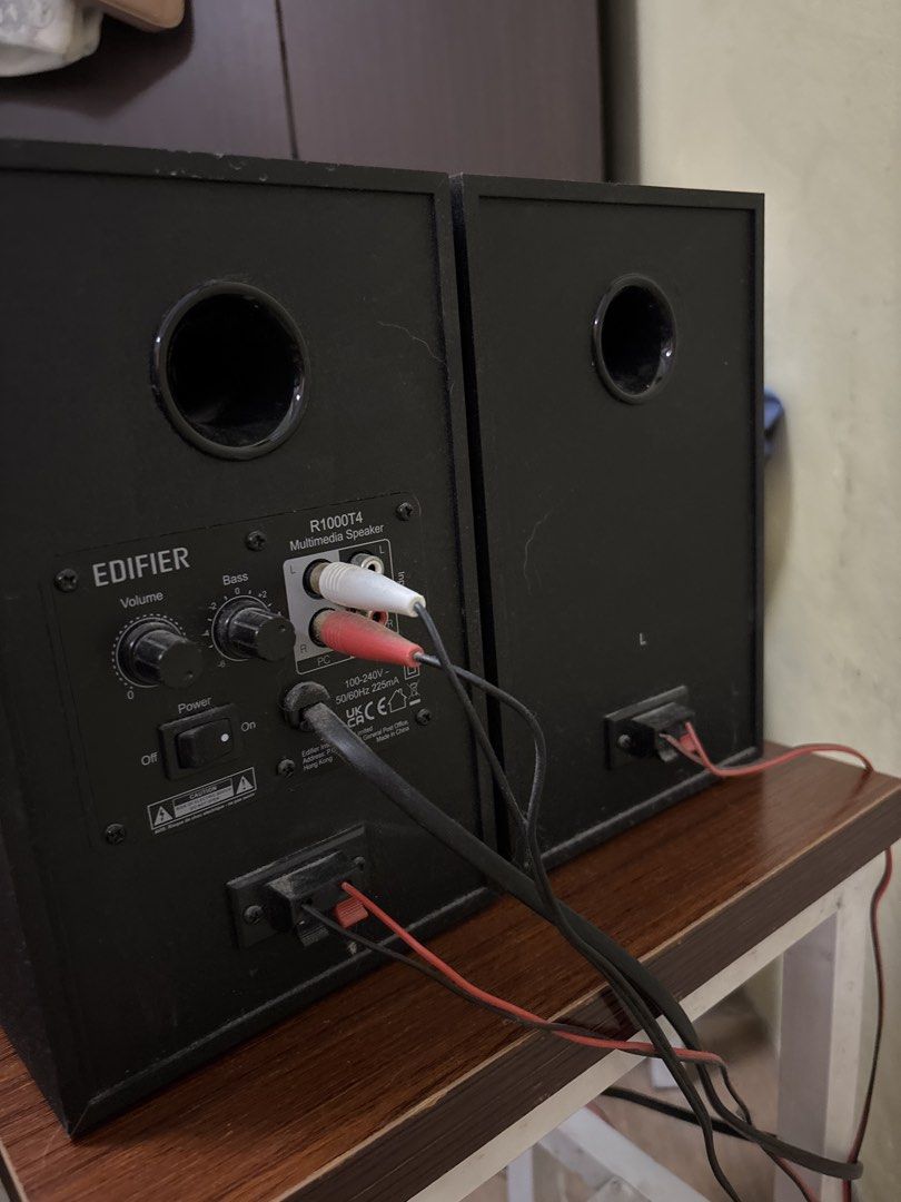 Edifier R1000T4 Multimedia Speaker (Category: Soundbars, Speakers & Amplifiers) located in Malabon City. Submitted by luxgoals (Listing ID 1470187107, Image 3). Description: - Model: Edifier R1000T4 Active Bookshelf Speakers - Design: Sleek black wooden cabinet with iconic yellow bass drivers - Sound Control: Dedicated volume and bass knobs on the back - Connectivity: Dual RCA audio inputs for easy PC or desktop setup - Extras: Removable front gr