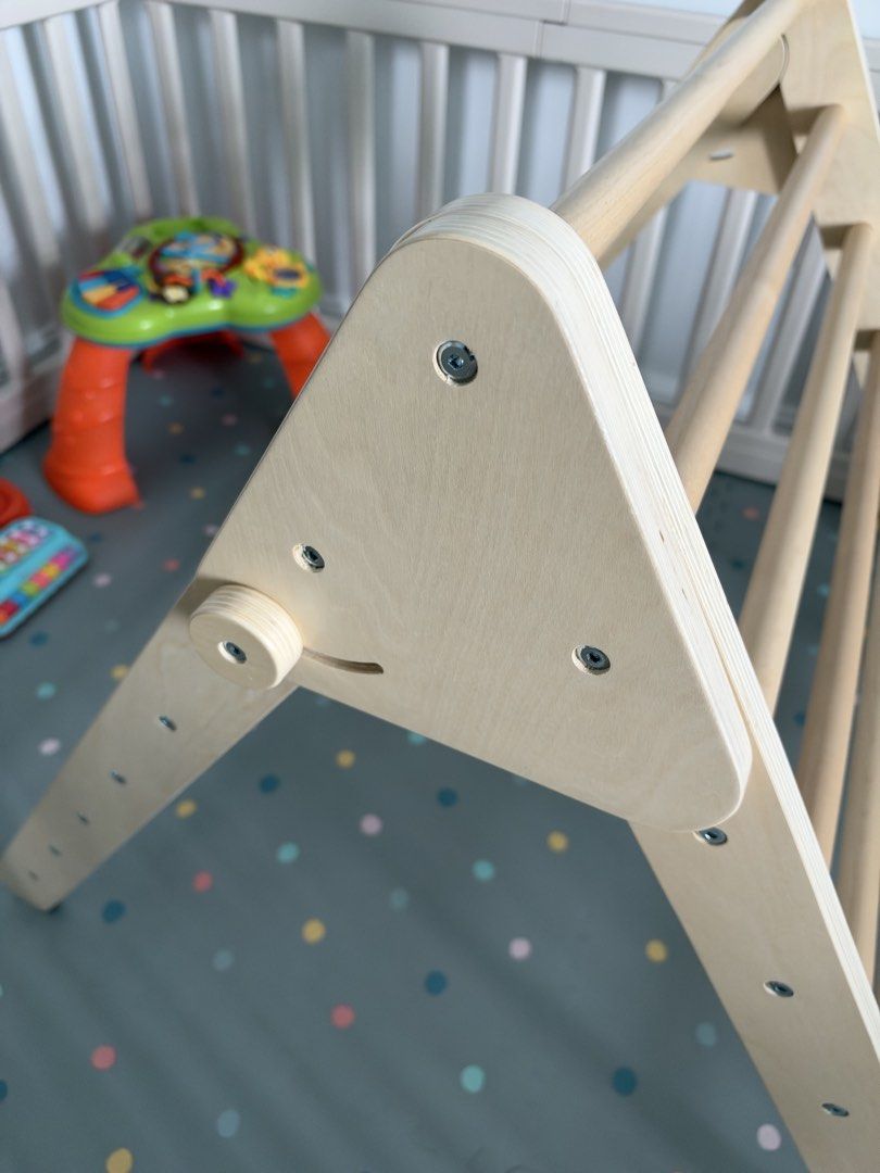 Educrate Wooden Climbing Triangle with Slide (Category: Infant Playtime) located in Caloocan City. Submitted by kianoto (Listing ID 1470175496, Image 3). Description: - Brand: Educrate - Item: Wooden climbing triangle and slide set - Material: Natural wood finish with smooth rungs - Features: Sturdy construction, great for indoor toddler gross motor skills - Inclusion: All wooden screw caps and hardware complete - Condition: Clean overall.