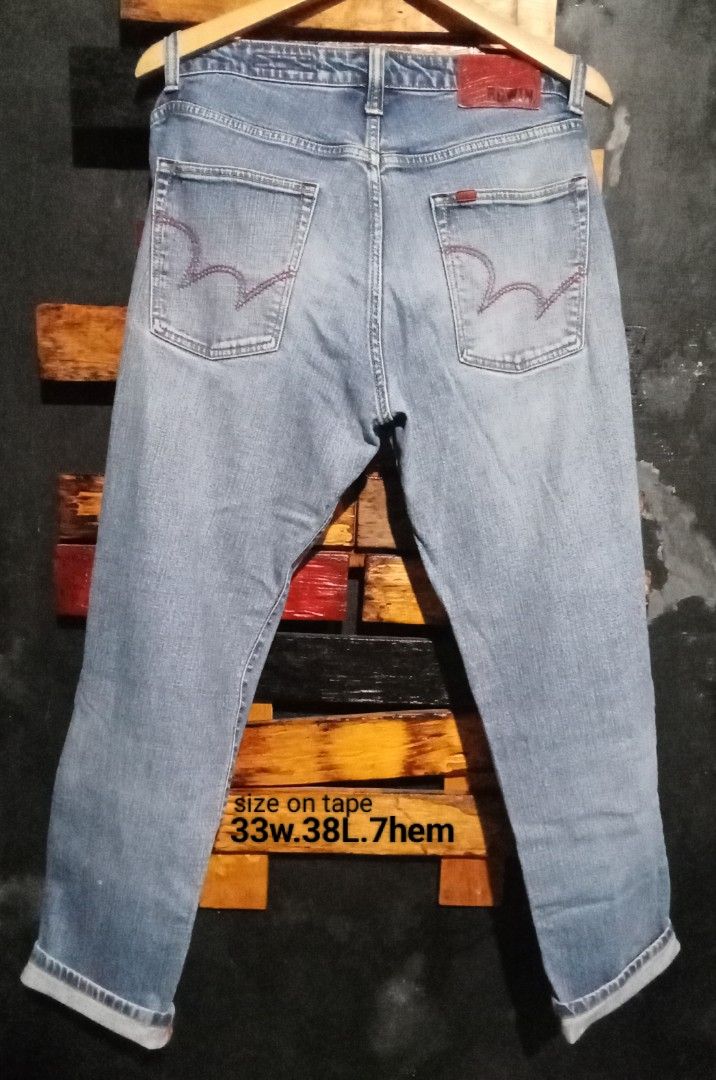 Edwin Edgeline Slim Fit Stretch Jeans Size 32 (Category: Jeans) located in Caloocan City. Submitted by calmcat_6fd4f7 (Listing ID 1470345548, Image 2). Description: - Brand: Edwin Edgeline - Wash: Light blue - Fit: Slim fit with stretch for comfort - Details: Classic 5-pocket setup, contrast stitching on back pockets, red leather brand patch on back waistband - Tag Size: 32 - Actual Measurements: 33" waist, 38.7" hem length - Condition: Excellent