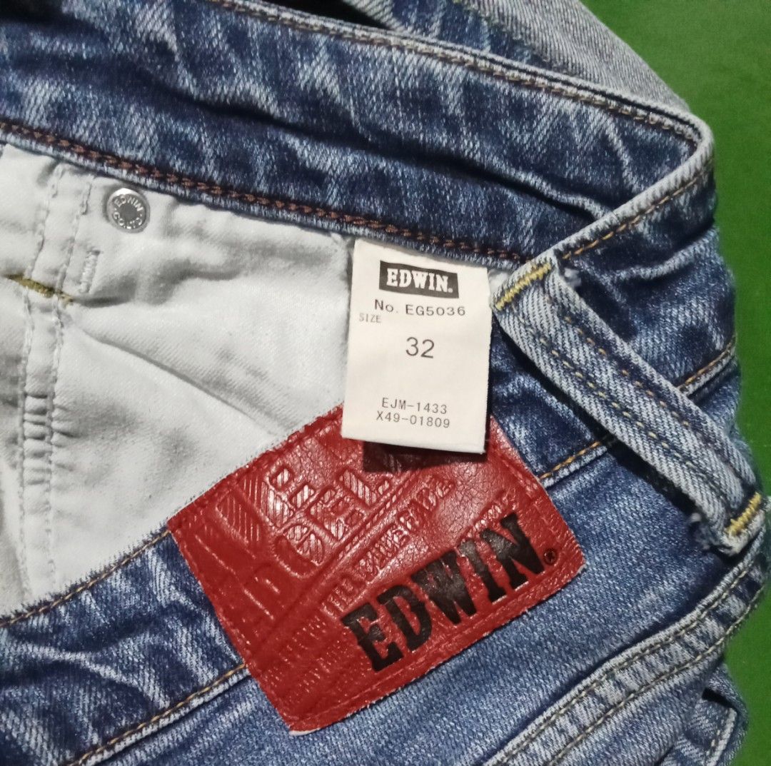 Edwin Edgeline Slim Fit Stretch Jeans Size 32 (Category: Jeans) located in Caloocan City. Submitted by calmcat_6fd4f7 (Listing ID 1470345548, Image 3). Description: - Brand: Edwin Edgeline - Wash: Light blue - Fit: Slim fit with stretch for comfort - Details: Classic 5-pocket setup, contrast stitching on back pockets, red leather brand patch on back waistband - Tag Size: 32 - Actual Measurements: 33" waist, 38.7" hem length - Condition: Excellent