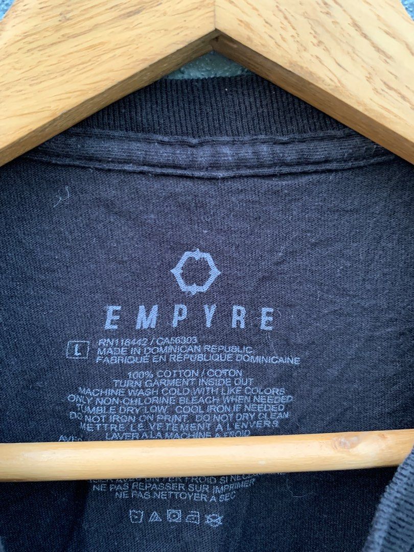 Empyre Black T-Shirt Size L (Category: Tshirts & Polo Shirts ) located in Manila. Submitted by rommelx-07 (Listing ID 1470257550, Image 3). Description: - Brand: Empyre - Size: Large - Color: Black with pink & orange graffiti bubble logo - Material: 100% Cotton - Origin: Made in Dominican Republic - Design: Classic crewneck, short sleeves - Care: Machine washable - Condition: Excellent for casual everyday wear.