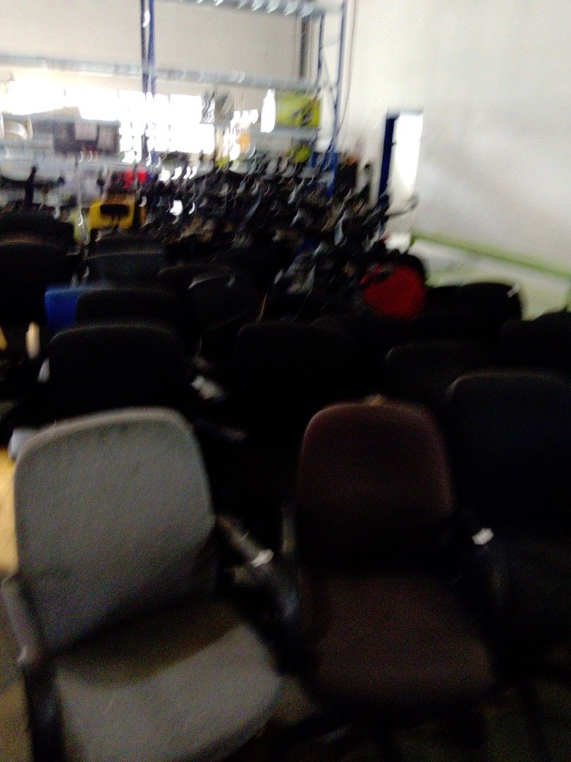 Ergonomic Office Chair with Armrests (Category: Office Furniture & Fixtures) located in Manila. Submitted by kamanowkhmr (Listing ID 1470171916, Image 3). Description: - Color: Sleek grey fabric - Mobility: Smooth-rolling wheels for hard floors and carpets - Adjustability: Easy height adjustment lever - Comfort: Padded seat and back support with standard black plastic armrests - Build: Solid construction, ideal for daily desk work and long hours.