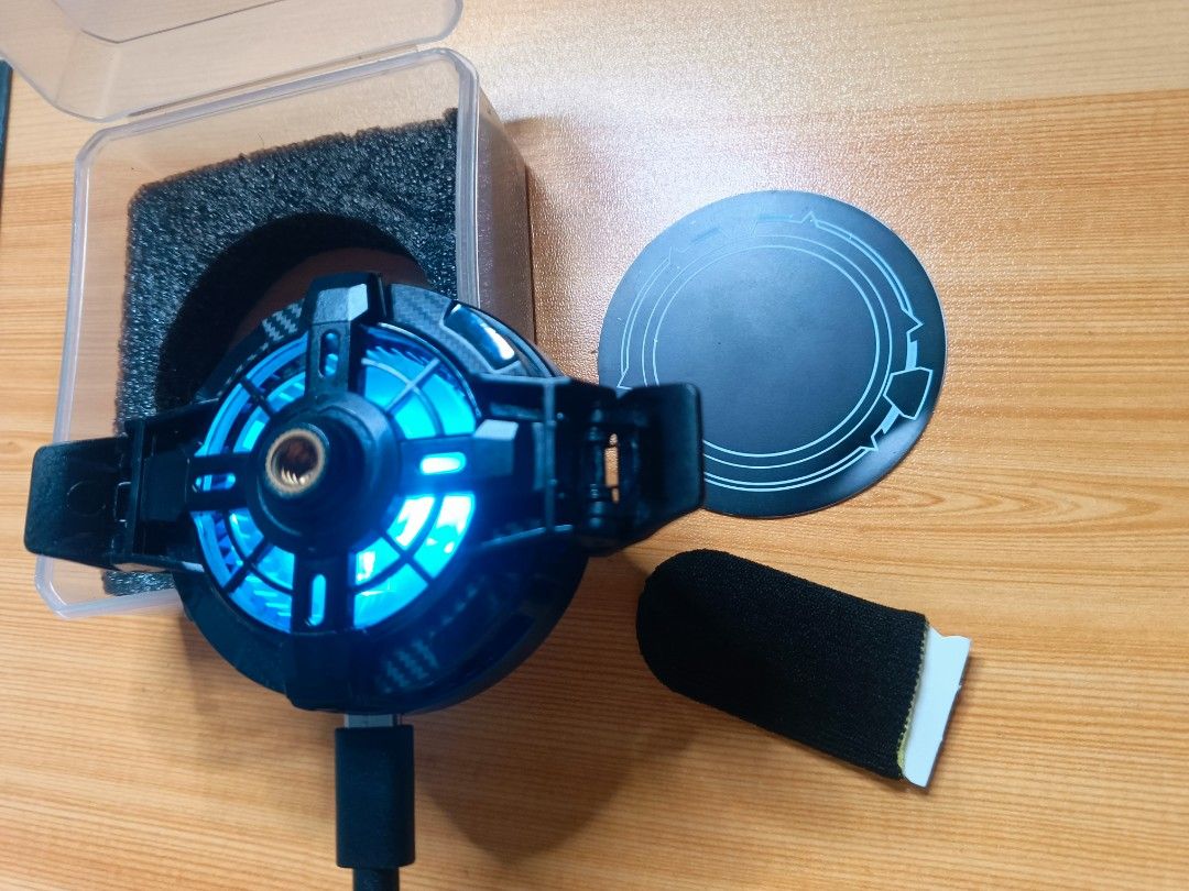 EX2 Pro Rapid Cooling Phone Cooler RGB (Category: Other Mobile & Gadget Accessories) located in San Juan City. Submitted by kintsugiwares (Listing ID 1470257804, Image 3). Description: 🔊 BAGSAK PRESYONG gaming smartphone cooler! 🥶 🎯 EX2 Pro Rapid Cooling Device Includes: - RGB lights 🎇 - Strong magnetic adaptor compatible with any phone for secure and easy attachment - Removable clip (no magnets needed) - Free gaming thumb cover cloth.