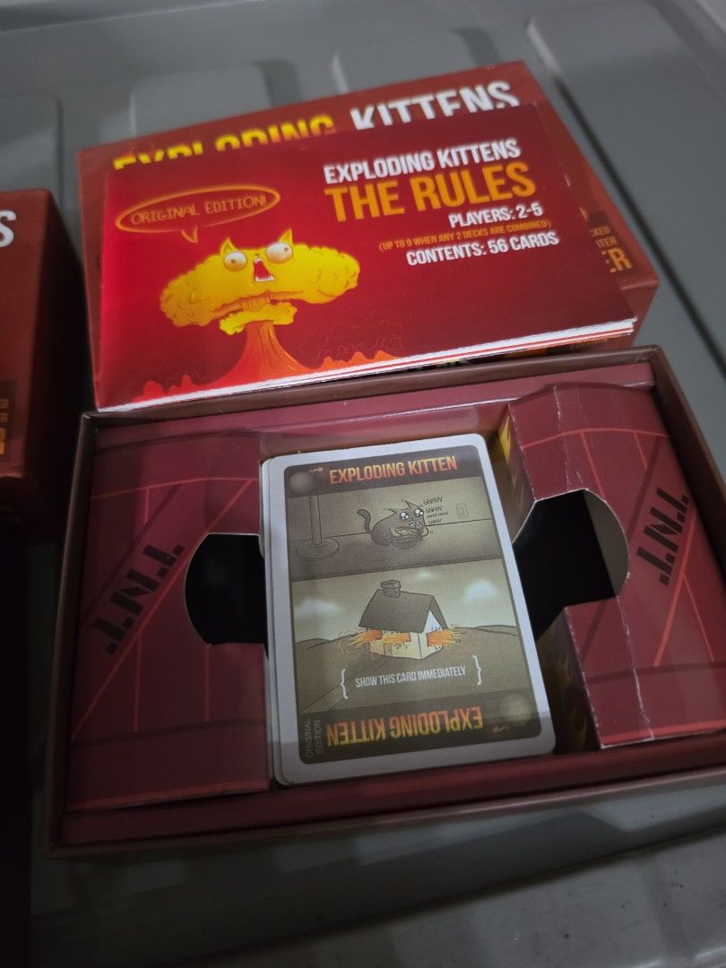 Exploding Kittens Card Game (2 pcs available) (Category: Board Games & Puzzles) located in Manila. Submitted by kimmmiii999 (Listing ID 1470146671, Image 3). Description: Exploding kittens. Used. See pics..