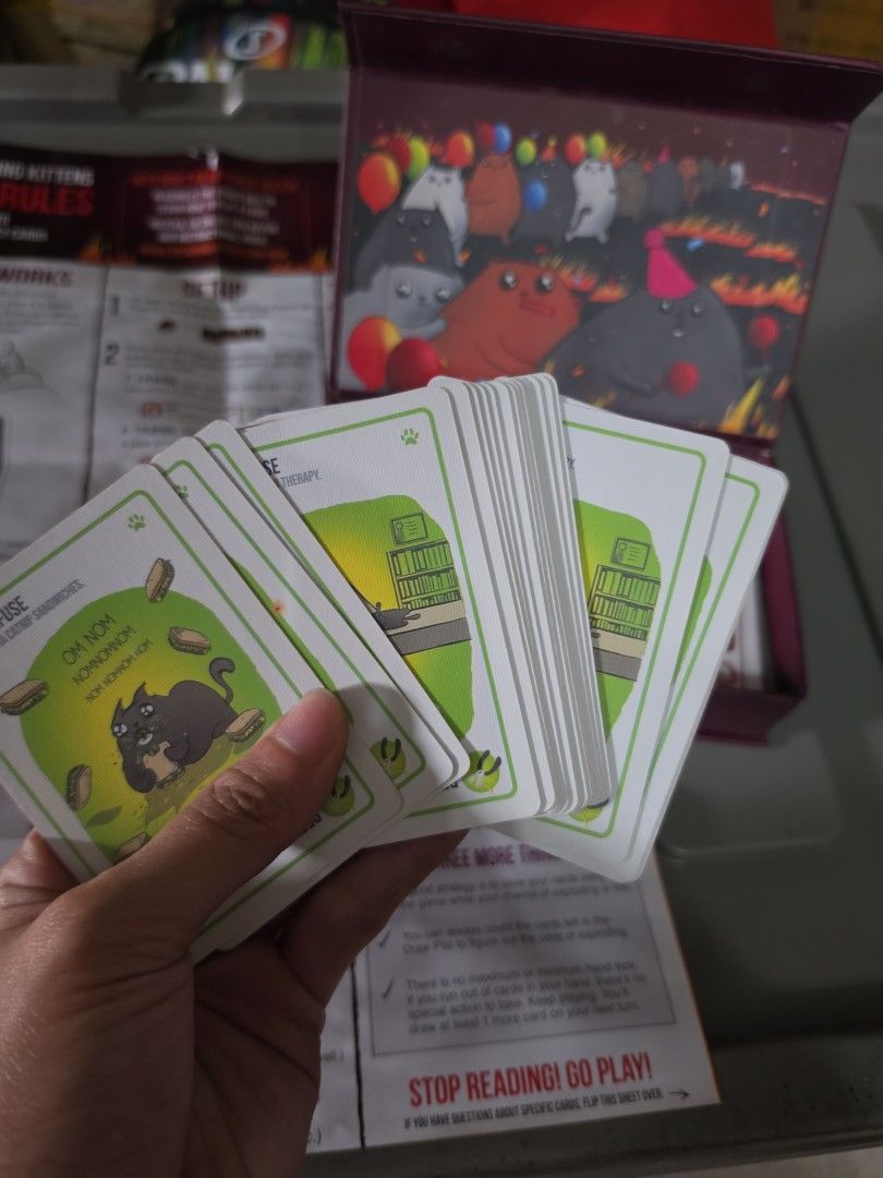 Exploding Kittens Party Pack Card Game (Category: Board Games & Puzzles) located in Manila. Submitted by kimmmiii999 (Listing ID 1470146166, Image 3). Description: - Game: Exploding Kittens Party Pack - Players: Supports up to 10 players - Gameplay: Fast-paced and easy to learn - Ideal For: Friends and family game nights - Condition: Standard board game packaging with clear text and artwork.