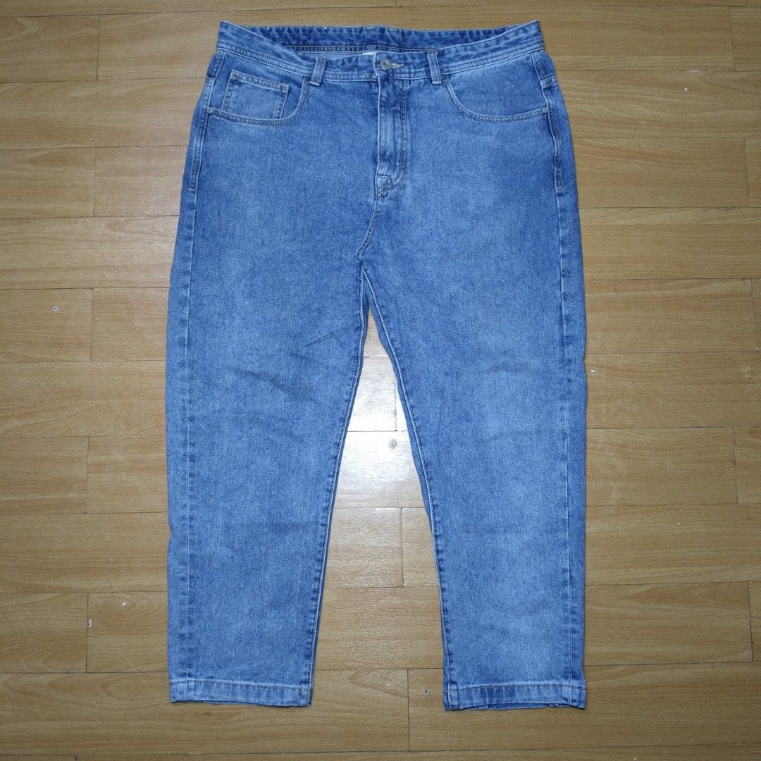 Fairwhale Blue Denim Jeans (Category: Jeans) located in Manila. Submitted by usedtobeyours26 (Listing ID 1470330041, Image 1). Description: - Brand: Fairwhale - Wash: Medium blue - Design: Classic five-pocket setup with standard belt loops - Details: Branded metal button closure and signature red pocket tag on the back - Quality: Clean stitching along seams and hems Disclaimer: Product Color May Slightly Vary Due to Photographic Lighting Sources 