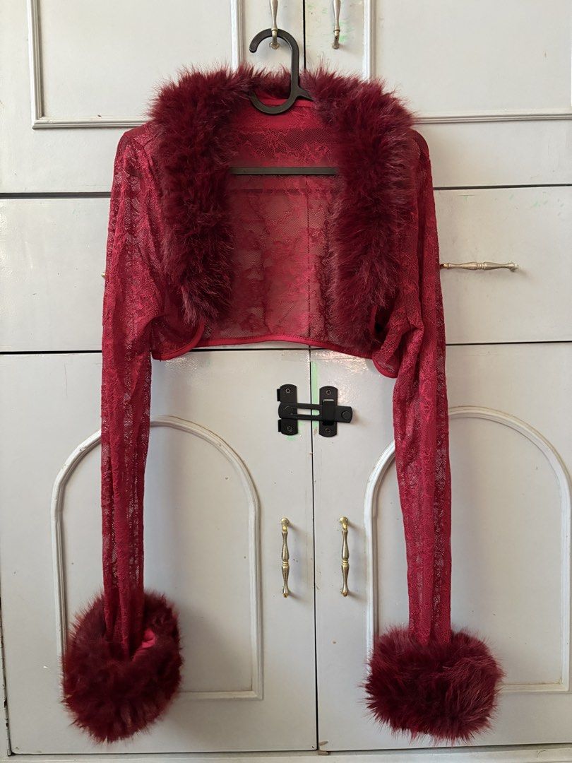 Faux Fur Jacket (Category: Coats, Jackets and Outerwear) located in Manila. Submitted by racajamess (Listing ID 1470263560, Image 1). Description: - Color: Deep red - Material: Lace with fluffy faux fur trim - Design: Open front, cropped fit, long sheer sleeves - Details: Plush faux fur collar and cuffs - Style: Y2K vibe, perfect for cozy layering.