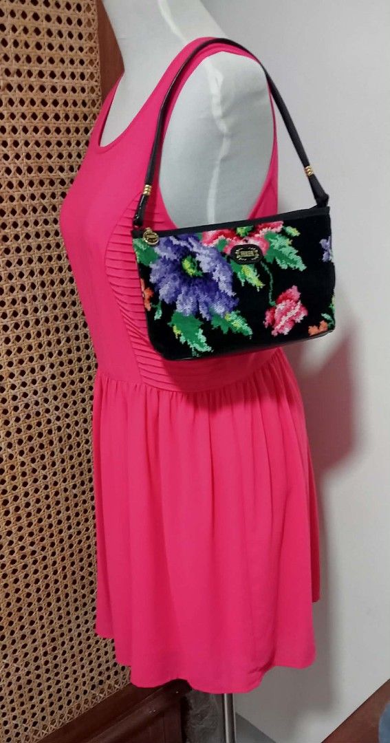FEILER Chenille Floral Shoulder Bag (Category: Shoulder Bags) located in Siniloan. Submitted by treyyasonlineshop (Listing ID 1470152829, Image 3). Description: - Material: Soft black chenille fabric with colorful purple, pink, and green floral pattern on both sides - Strap: Black leather-like shoulder strap accented with gold-tone hardware links - Closure: Secure zip-top closure - Interior: Fabric-lined with an official brand patch - Fit: Compac