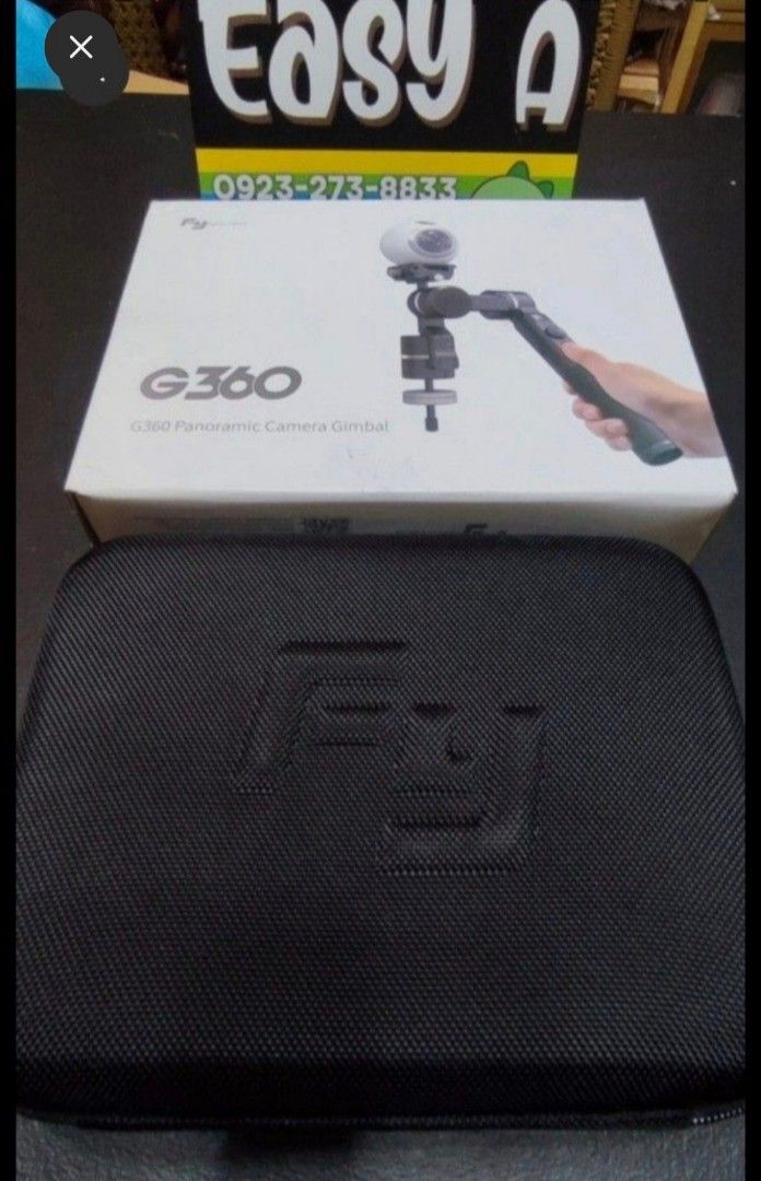 FeiyuTech G360 Panoramic Camera Gimbal (Category: Gimbals & Stabilizers ) located in Manila. Submitted by easy_a (Listing ID 1470308837, Image 2). Description: - Model: FeiyuTech G360 panoramic camera handheld stabilizer - Condition: Fully functional, well-maintained - Includes: Original box and premium hard carrying case with custom foam cutout - Accessories: Motorized gimbal unit, handle grip, battery, and all original accessories neatly organi