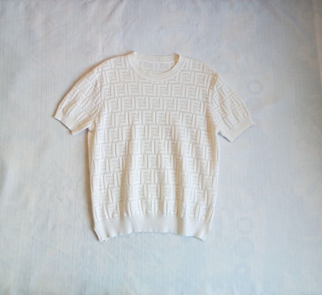 Fendi monogram knitted top (Category: Shirts) located in Bagabag. Submitted by thrift_stories96 (Listing ID 1470259001, Image 1). Description: Fendi monogram knitted top Medium Length - 21.5 Width - 18 Condition - excellent Flaw - cut necktag by previous owner With washtag,no major flaw..