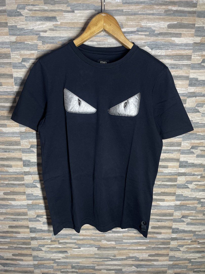 Fendi Silver Eyes Black Tee (Category: Tshirts & Polo Shirts ) located in Cabuyao City. Submitted by randelwru (Listing ID 1470156368, Image 1). Description: Fendi Silver Eyes Black Tee Size Medium Width 20 Length 27 Excellent Condition 560🏷️Pesos Cabuyao Laguna📍 .