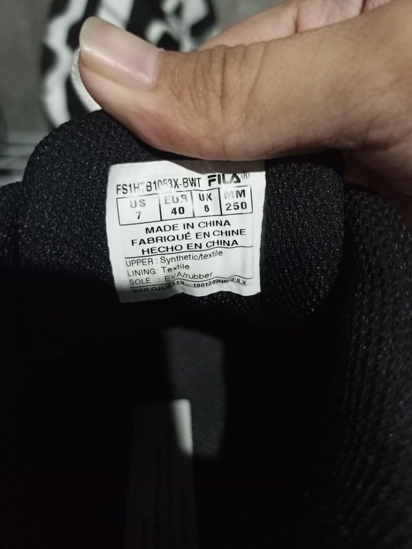 Fila chunky black white sneakers US 7 (Category: Sneakers) located in Mabalacat. Submitted by hasashoe (Listing ID 1470280280, Image 3). Description: - Brand: Fila - Colorway: Classic Black and White - Size: US 7 | EUR 40 | UK 6 | MM 250 - Material: Synthetic and textile upper with EVA and rubber sole - Features: Textured thick soles for maximum grip, lace-up closure, and iconic branded details on side panels and outsole - Origin: Made in China -