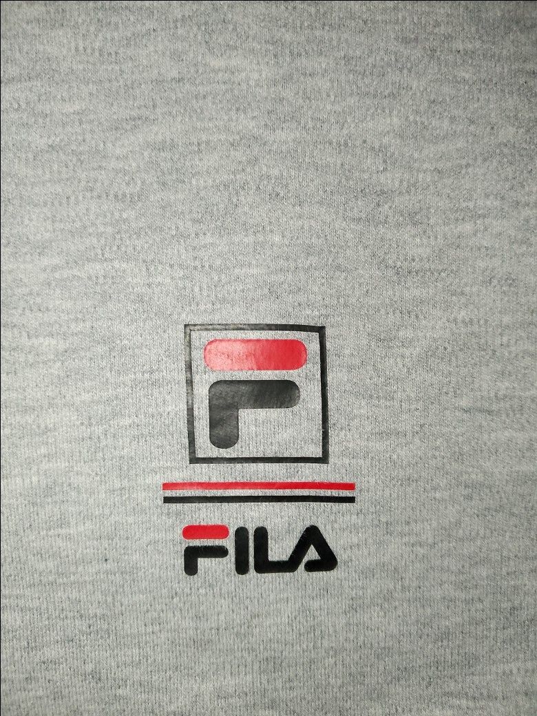 FILA' CREW NECK SWEATSHIRT (Category: Coats, Jackets and Outerwear) located in Saint Bernard. Submitted by j0h_mhongg (Listing ID 1470180889, Image 2). Description: - DIMES: 23 × 27 - L ON TAG - NO ISSUE - GOOD AS NEW CONDITION - 10/10 COLOR RATE - FILA' CREW NECK SWEATSHIRT - WE HAVE A FREEBIES ITEMS.