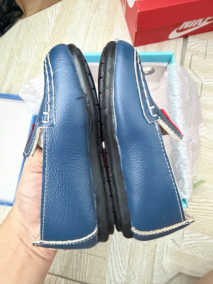 Fisher-Price Darrius Blue Loafers (Category: Babies & Kids Fashion) located in Naga. Submitted by suit_yourslf (Listing ID 1470150528, Image 3). Description: - Brand: Fisher-Price (Darrius style) - Color: Blue with red, white, and blue stripe details - Size: Toddler Size 5 - Design: Easy slip-on loafers with white contrast stitching - Inclusions: Original box included - Condition: Great for casual wear or special occasions.