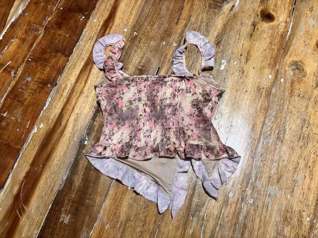 Floral mesh asymmetrical y2k corset top (Category: Sleeveless) located in Cagayan de Oro. Submitted by kirkwax_4 (Listing ID 1470285960, Image 2). Description: Floral mesh asymmetrical corset top Small frame Xcellent condition No issue 1k.