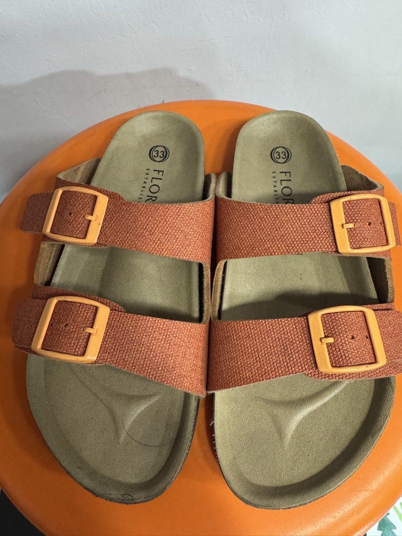 Florsheim Orange Double Buckle Sandals Size 33 (Category: Babies & Kids Fashion) located in Valenzuela. Submitted by sofiasticated.decluttering (Listing ID 1470157581, Image 1). Description: - Brand: Florsheim - Color: Vibrant orange - Size: 33 (printed on insole) - Design: Double strap with adjustable matching buckles - Footbed: Contoured cork for maximum support - Style: Casual footwear, great for everyday wear ✨ PRELOVED KIDS’ CLOTHES/SHOES✨ S