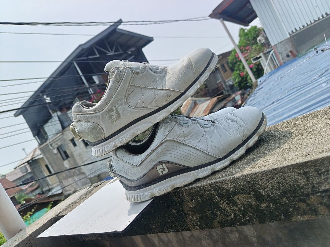 FootJoy Pro/SL BOA White Golf Shoes BUNDLE US 7 (Category: Golf) located in Davao. Submitted by judethrifter (Listing ID 1470174453, Image 3). Description: - Brand: FootJoy Pro/SL Golf Shoes - Color: Clean White - Closure: BOA lacing system for quick, secure adjustments - Design: Spikeless with rubber traction pods for reliable grip - Condition: Leather uppers show minor creasing from regular rounds; outsoles are clean overall - Performance: Ligh