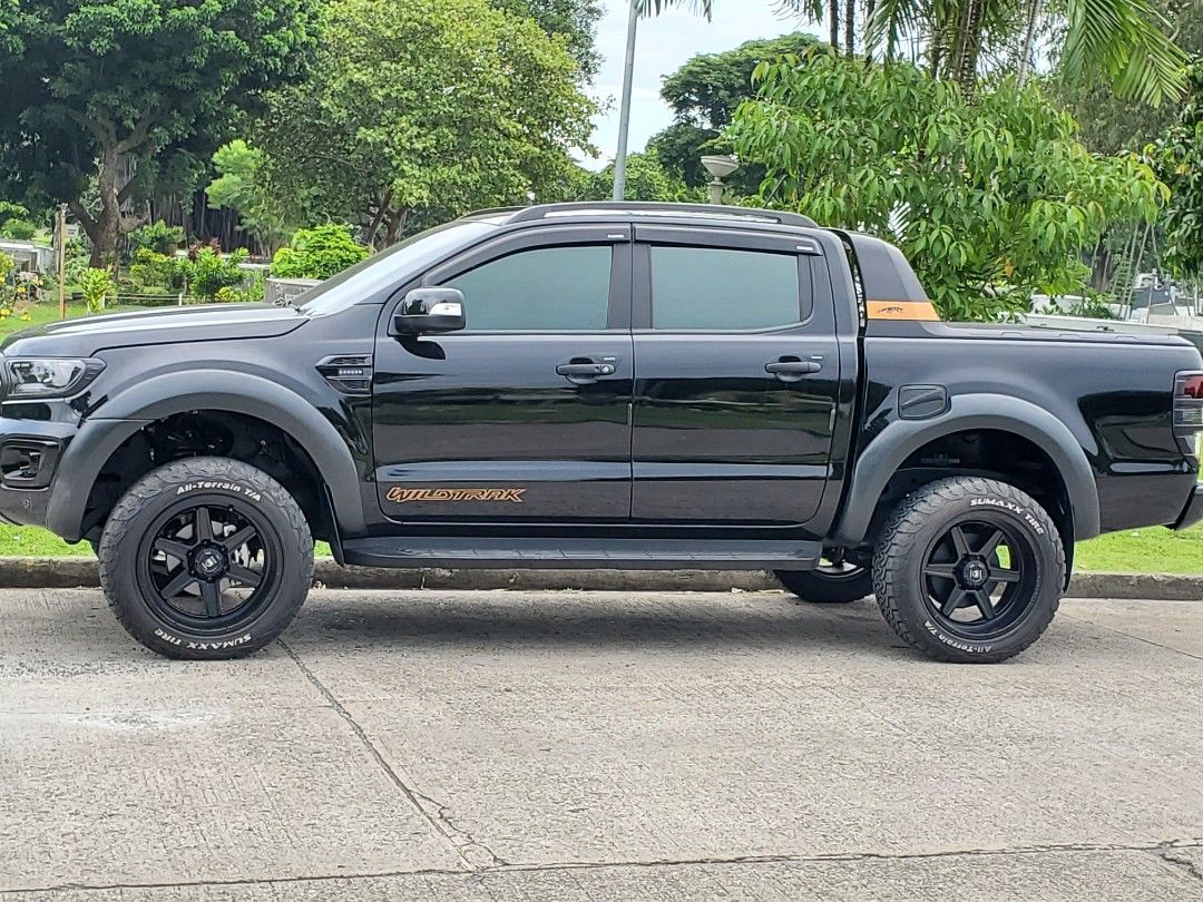 Ford Ranger (Category: Used Cars) located in Marikina City. Submitted by brightlion.8fc40a (Listing ID 1470241461, Image 3). Description: 🚘 FOR SALE: 2022 Ford Ranger Wildtrak 4x2 - AT Mileage: 22,000+ km Color: Black Coding: Tuesday First owner | Casa-maintained No Internal/External issues, 100% flood free or never involved in an accident (check w/ LTO) Inclusions & Upgrades: Roller lid manual, Pickup truck tailgate adjustable ladder, 3 pcs rub