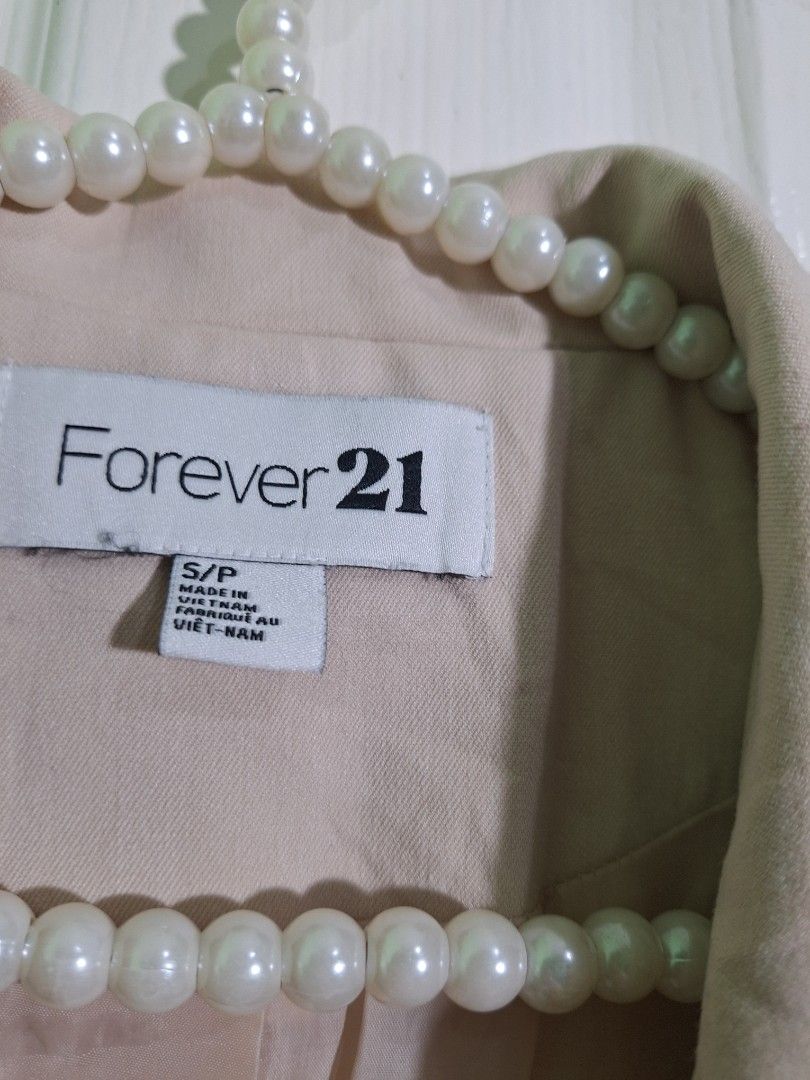 Forever 21 oversized single breasted blazer / coat / suit xs - small (Category: Coats, Jackets and Outerwear) located in San Pablo. Submitted by allyourbrandedneeds (Listing ID 1470145006, Image 3). Description: - Brand: Forever 21 - Size: S - Color: Classic beige (neutral tone) - Design: Single-button closure, structured collar and lapels, two functional welt pockets - Interior: Fully lined - Material: Polyester, rayon, and spandex blend (Made i