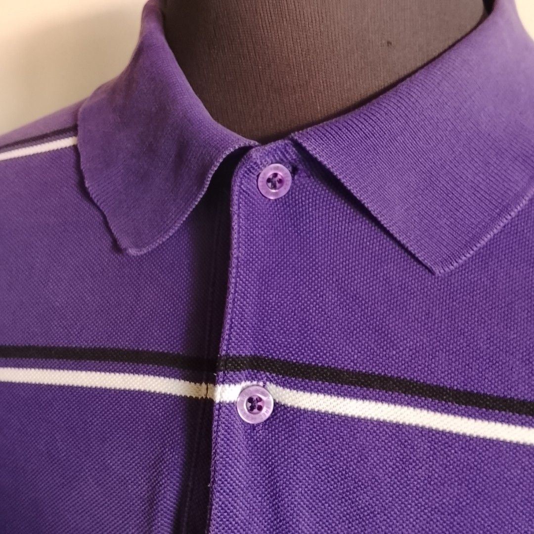 Fred Perry - Purple Stripe Polo Shirt (Category: Luxury Apparel) located in Angeles City. Submitted by sselects_ (Listing ID 1470157996, Image 3). Description: Details of the item: *Color may vary due to lighting Size: M on tag Width: 20" Length: 28" Issue: sign of usage as seen on photos Condition: Good ALL ITEMS ARE NEGOTIABLE.