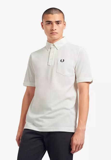 Fred Perry Buttondown Polo Shirt (Category: Formal Shirts) located in Imus. Submitted by rckrmns (Listing ID 1470218540, Image 1). Description: Fred Perry Buttondown Polo Shirt Size M W- 20 L- 28 Good as new no issues 1,300.