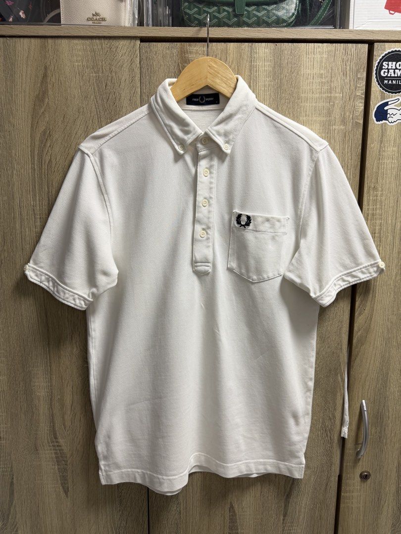 Fred Perry Buttondown Polo Shirt (Category: Formal Shirts) located in Imus. Submitted by rckrmns (Listing ID 1470218540, Image 2). Description: Fred Perry Buttondown Polo Shirt Size M W- 20 L- 28 Good as new no issues 1,300.