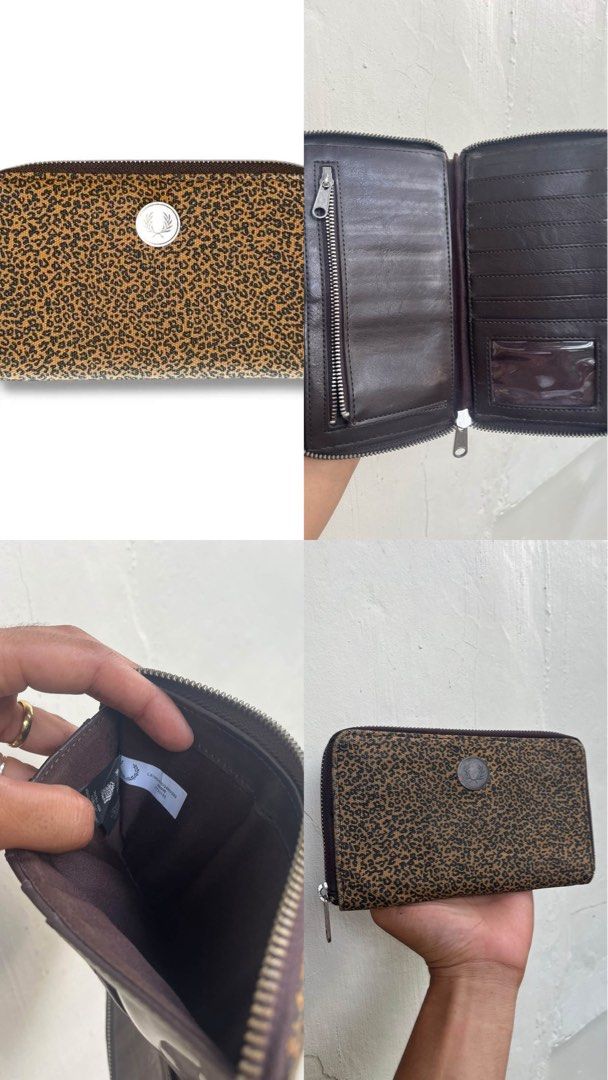 Fred Perry Leopard Print Zip Wallet (Category: Wallets & Card holders) located in Kidapawan. Submitted by frizzyjayne (Listing ID 1470231761, Image 1). Description: - Brand: Fred Perry - Exterior: Stylish leopard print pattern - Interior: Brown with product code tags - Closure: Secure zip-around design - Features: Multiple card slots, cash compartments, coin zipper pocket, and clear ID window - Size: Compact and easy to fit in bags.