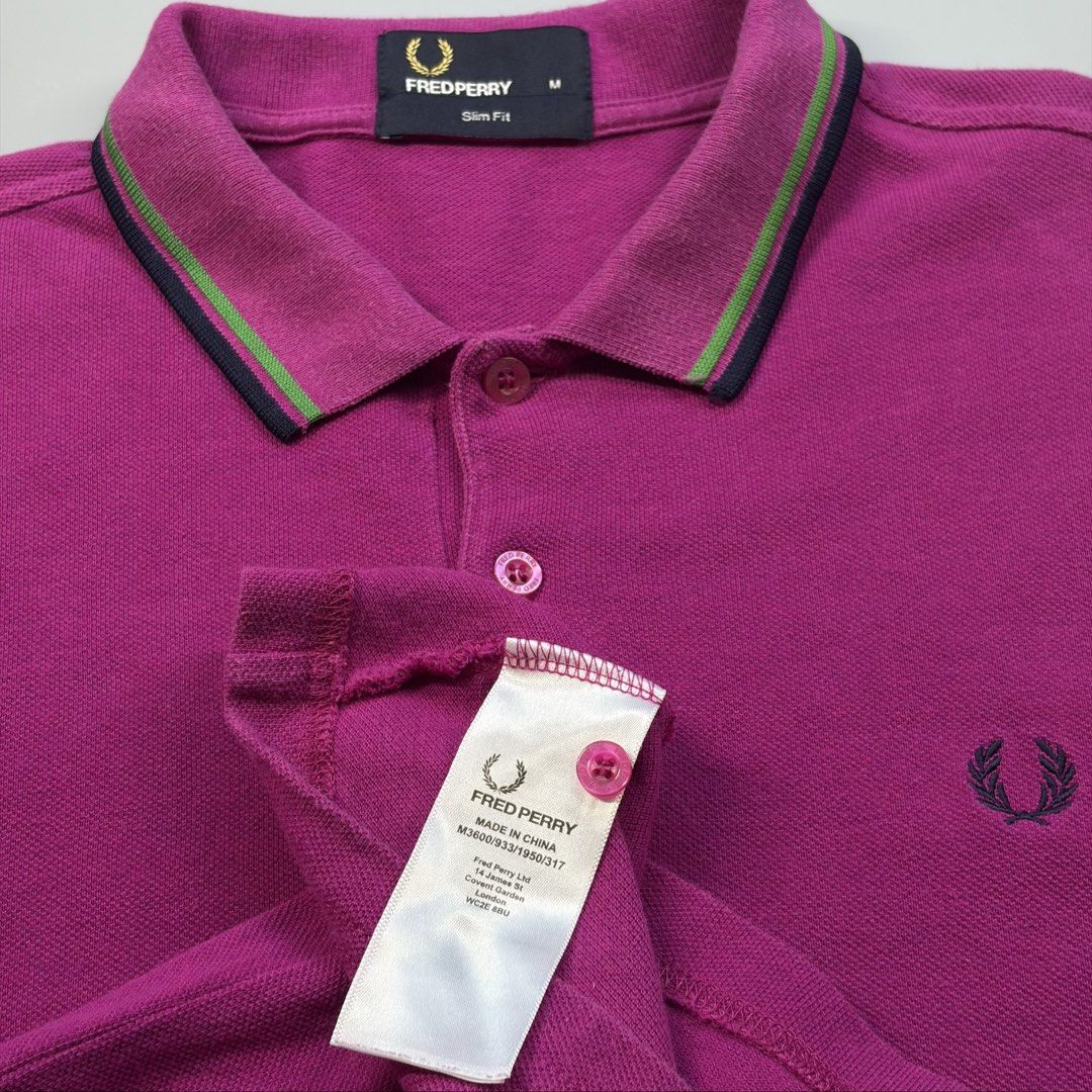 Fred Perry Twin Tipped (Authentic) (Category: Luxury Apparel) located in Cavite. Submitted by onebeancent (Listing ID 1470344936, Image 3). Description: Size: Medium (Men) | Large to XL (Women's) Dimension: 19" Width | 27" Length Color: Magenta Purple Color Rate: 9.5/10 Issue: None Condition: Excellent Price: 980php Additional Shipping Fee (J&T Small Pouch) 75php Luzon 100php visayas 120php mindanao.