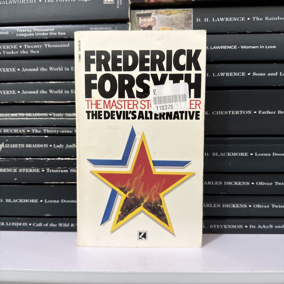 Frederick Forsyth The Devil's Alternative Paperback (Category: Storybooks) located in Lingayen. Submitted by readwjane (Listing ID 1470153978, Image 1). Description: - Title & Author: The Devil's Alternative by Frederick Forsyth - Genre: Classic political suspense thriller - Cover: Distinctive red and blue star design - Condition: Pages are clean and intact; paper spine shows light shelf wear - Ideal for: Fans of gripping geopolitical fiction.