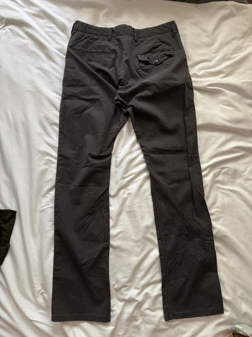 French Connection Grey Chinos Size 30 (Category: Chinos) located in Cebu City. Submitted by _t.rix (Listing ID 1470164224, Image 3). Description: - Brand: French Connection - Size: 30 - Colour: Dark Grey (Solid neutral) - Fit: Straight leg silhouette - Closure: Standard button fly - Pockets: Front slant pockets and back welt pockets with button flap detailing - Details: Clean interior lining with printed branding on the waistband - Condition: Gre