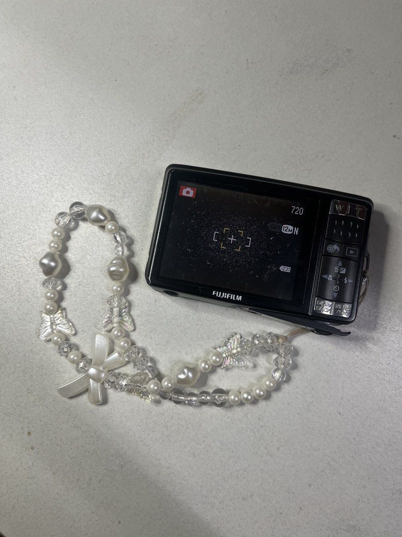 Fujifilm FinePix Z70 Digital Camera (Category: Cameras) located in Manila. Submitted by ashayuyu (Listing ID 1470228350, Image 2). Description: DM FOR SAMPLE PICS > Price is negotiable for SURE BUYERS Model: Fujifilm FinePix Z70 DigiCam Color: Black Zoom: 5x optical zoom Powers on, shoots well, screen and battery working fine fujifilm finepix z70 - 2.1k inclusion: cam ofc! fujifilm charger (lost the cord that connects them tho..), new battery, ca