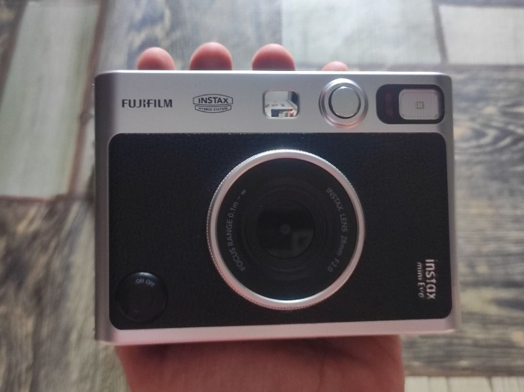 FUJIFILM INSTAX MINI EVO (Category: Cameras) located in Caloocan City. Submitted by pzkas (Listing ID 1470176462, Image 1). Description: 📸 FUJIFILM INSTAX MINI EVO 💰: 6500 (fixed) ❗LIKE NEW CONDITION & NO ISSUE❗ 📋 DETAILS: ✨ 5x lang nagamit ✨ COSMETICS: 9.5/10 (no scratches / flaw) ✨ All buttons working ✨ Fully functional 📋 INCLUSION (gagamitin nalang): ✔️ Original Fujifilm Neck Strap ✔️ 32GB Original SD Card ✔️ Drawstring Camera Pouch ✔️ 6 p